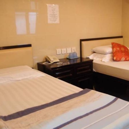 Lily Guest House Цзюлун Экстерьер фото